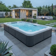 Swim Spa teilversenkt eingebaut Reluxis Donau Riverjet Life Wellis Pool kaufen Swimspa Pool mit Abdeckung Outdoor Garten Deutschland Österreich Berlin München Köln Wien Graz Linz