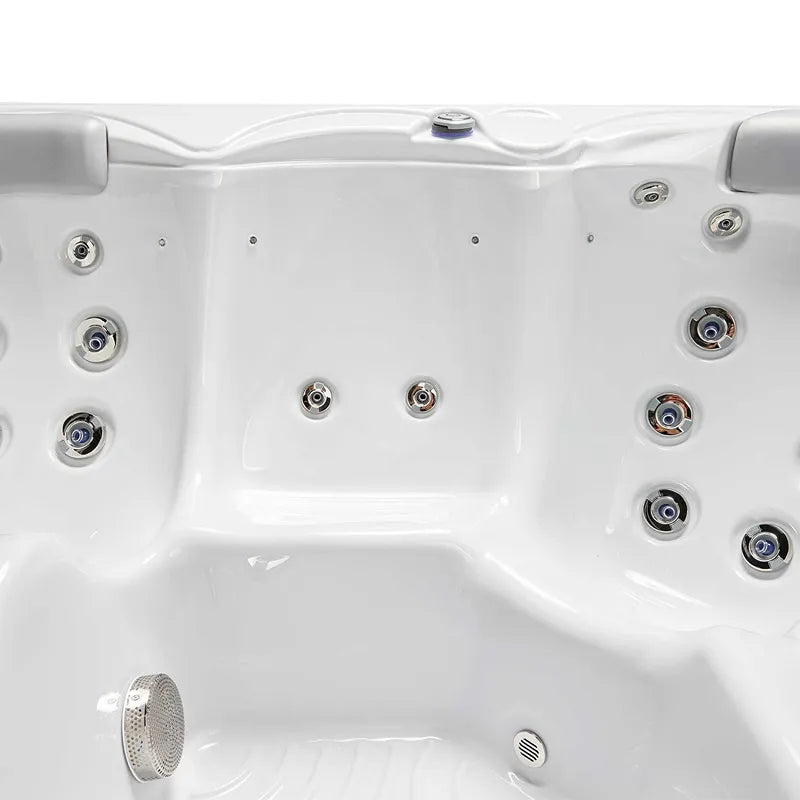 Wellis Whirlpool Outdoor 4 - 5 Personen winterfest Reluxis Pluto im Garten kaufen 4 eckig Detailbild Düsen Sitzplatz
