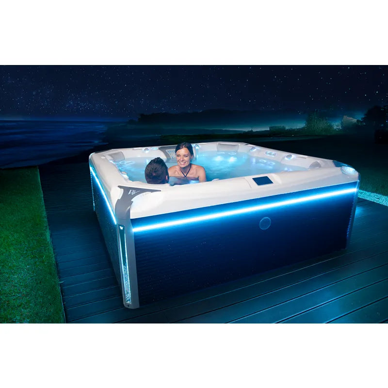Whirlpool Outdoor 6 - 7 Personen winterfest Reluxis Elbrus Life Wellis Garten kaufen nachts beleuchten mi 2 Persnen