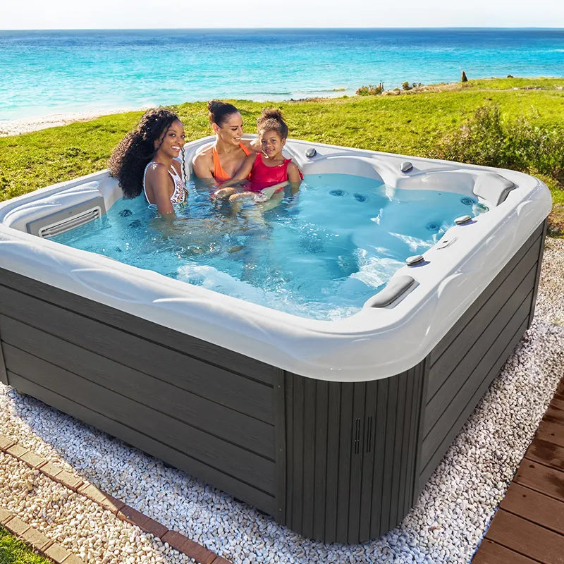 Whirlpool Outdoor 6 Personen winterfest Reluxis Venus Wellis für den Garten kaufen quadratisch 3 Personen drin am Meer