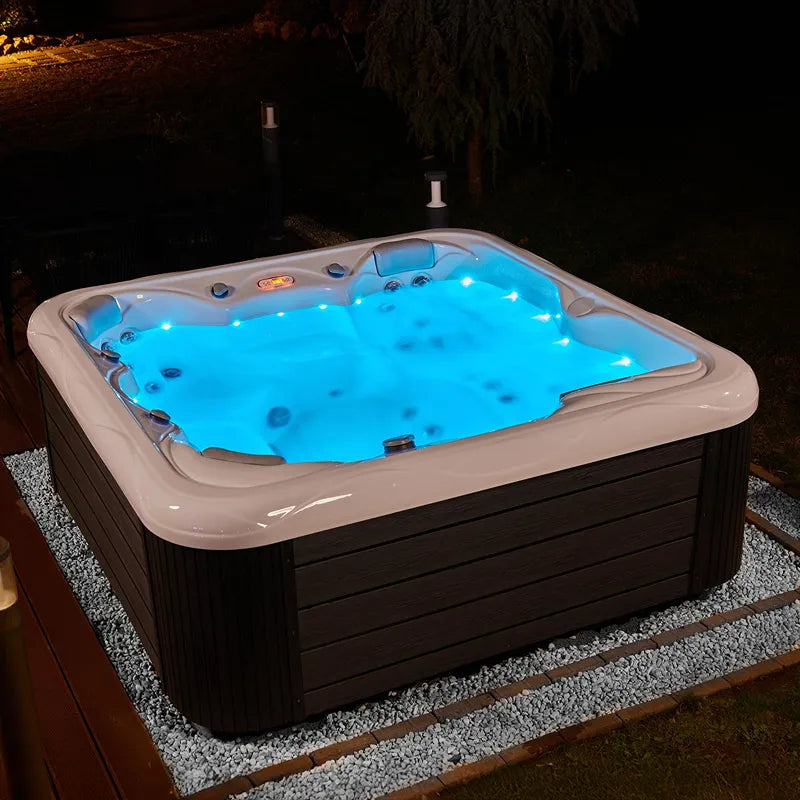 Whirlpool Outdoor 6 Personen winterfest Reluxis Venus Wellis für den Garten kaufen quadratisch nachts beleuchtet